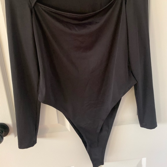 Black bodysuit from H&M. In size large. Going out top. - Picture 2 of 3